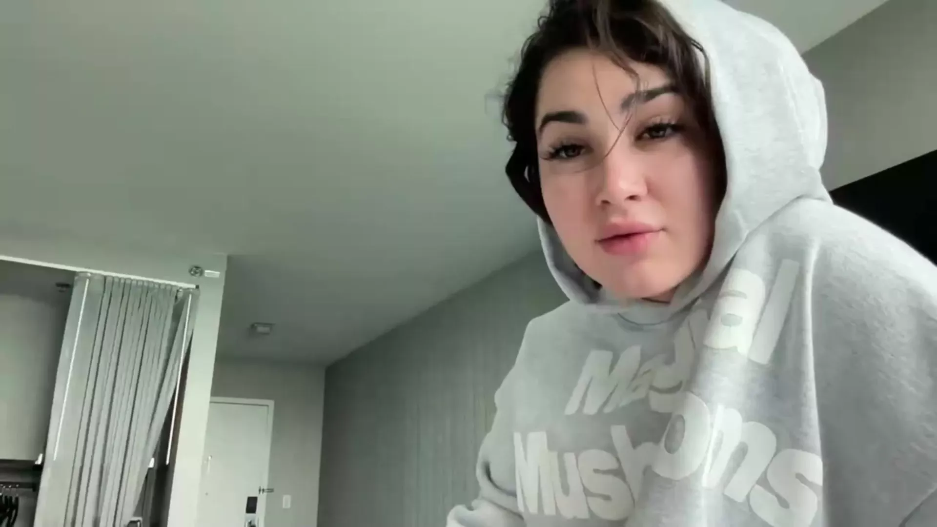 Lupuwellness teasing her naked big tits from her sweater
