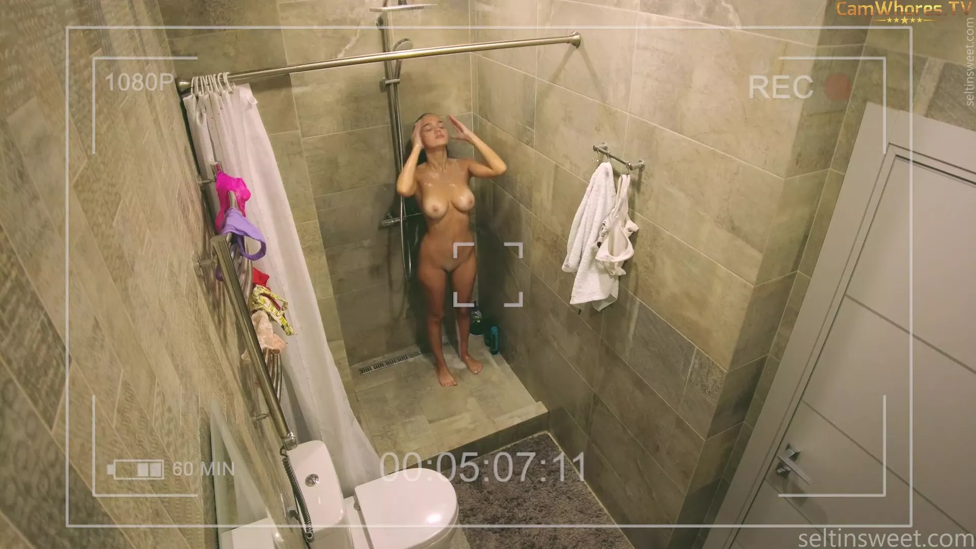 Seltin teasing her wet naked body in the shower