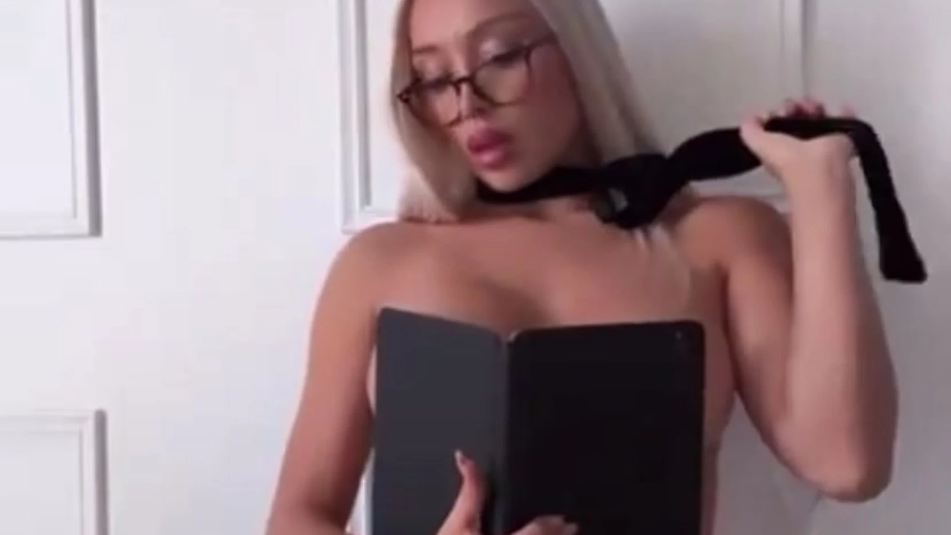 Daniella Chavez teasing her huge naked tits as a secretary