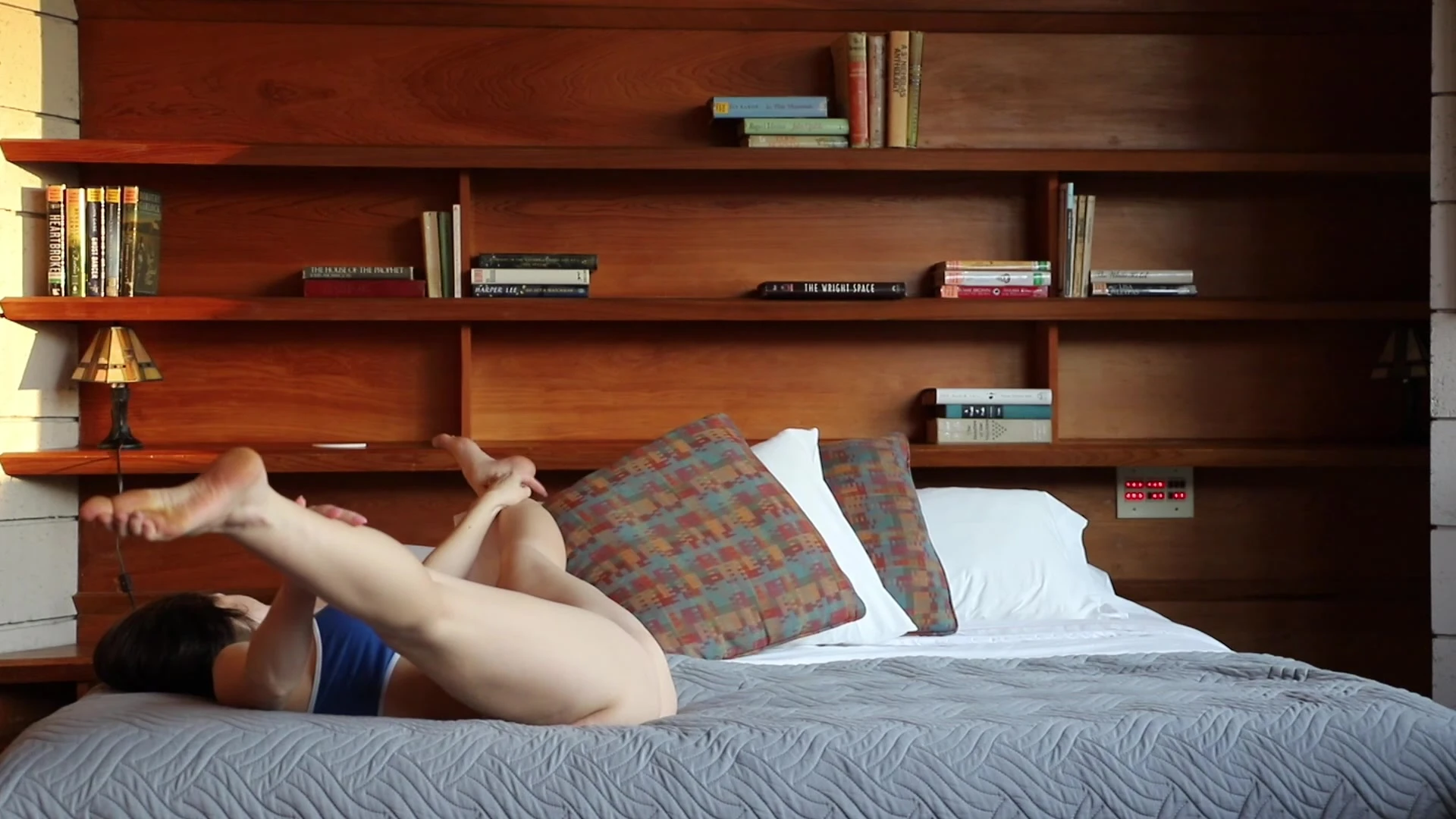 hot babe Abby Opel spreading her feet and pussy in bed