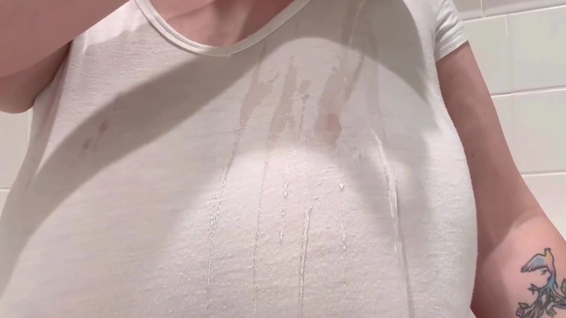 Gwyther teasing her huge breasts in wet t-shirt